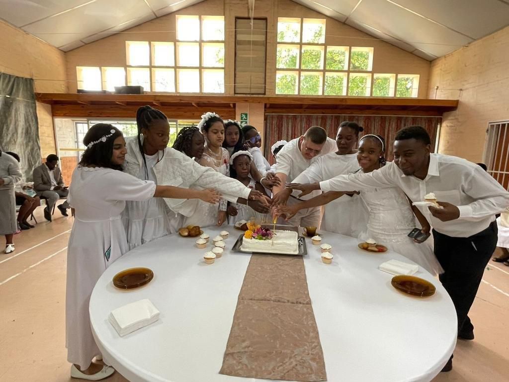 First Holly Communion - Cutting the cake
