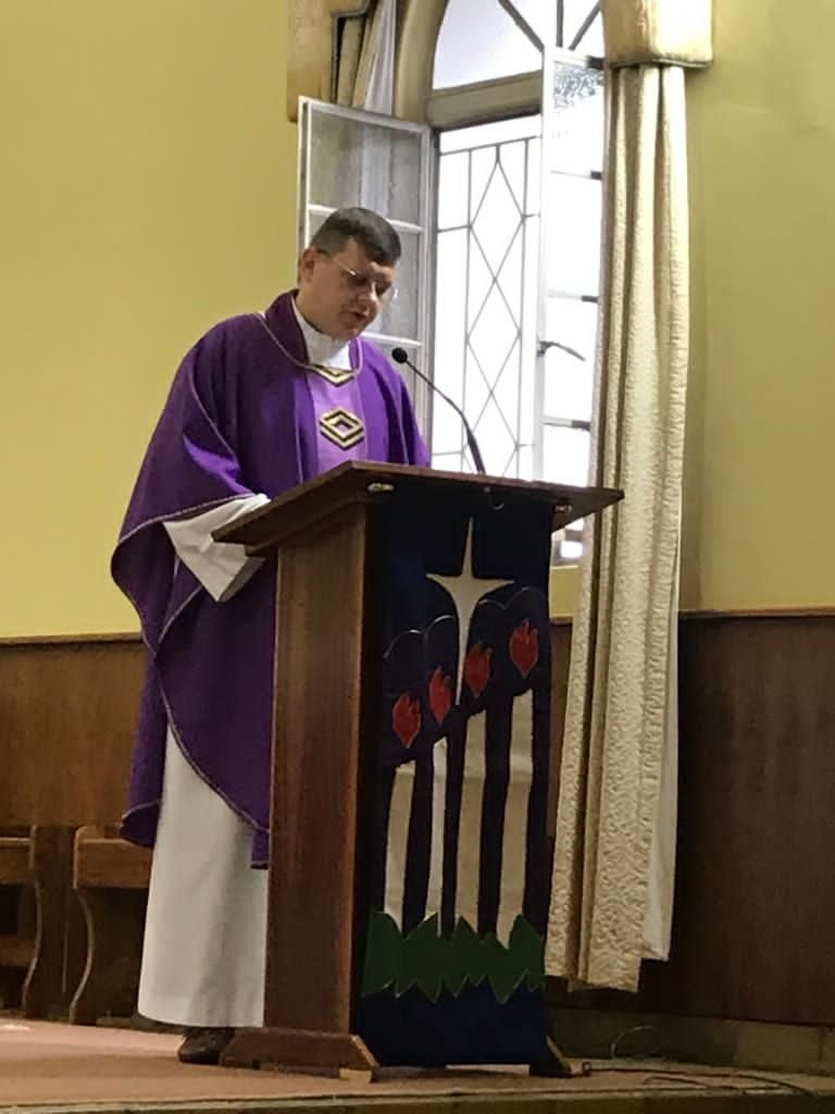 Father Marek Mlynarczyk saying his homily