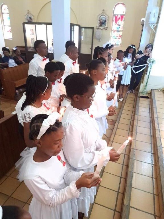 First Holly Communion - Taking communion
